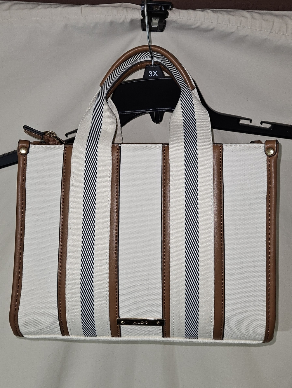 Aldo Cream Canvas Tote with Brown Trim and Navy-Striped Handles